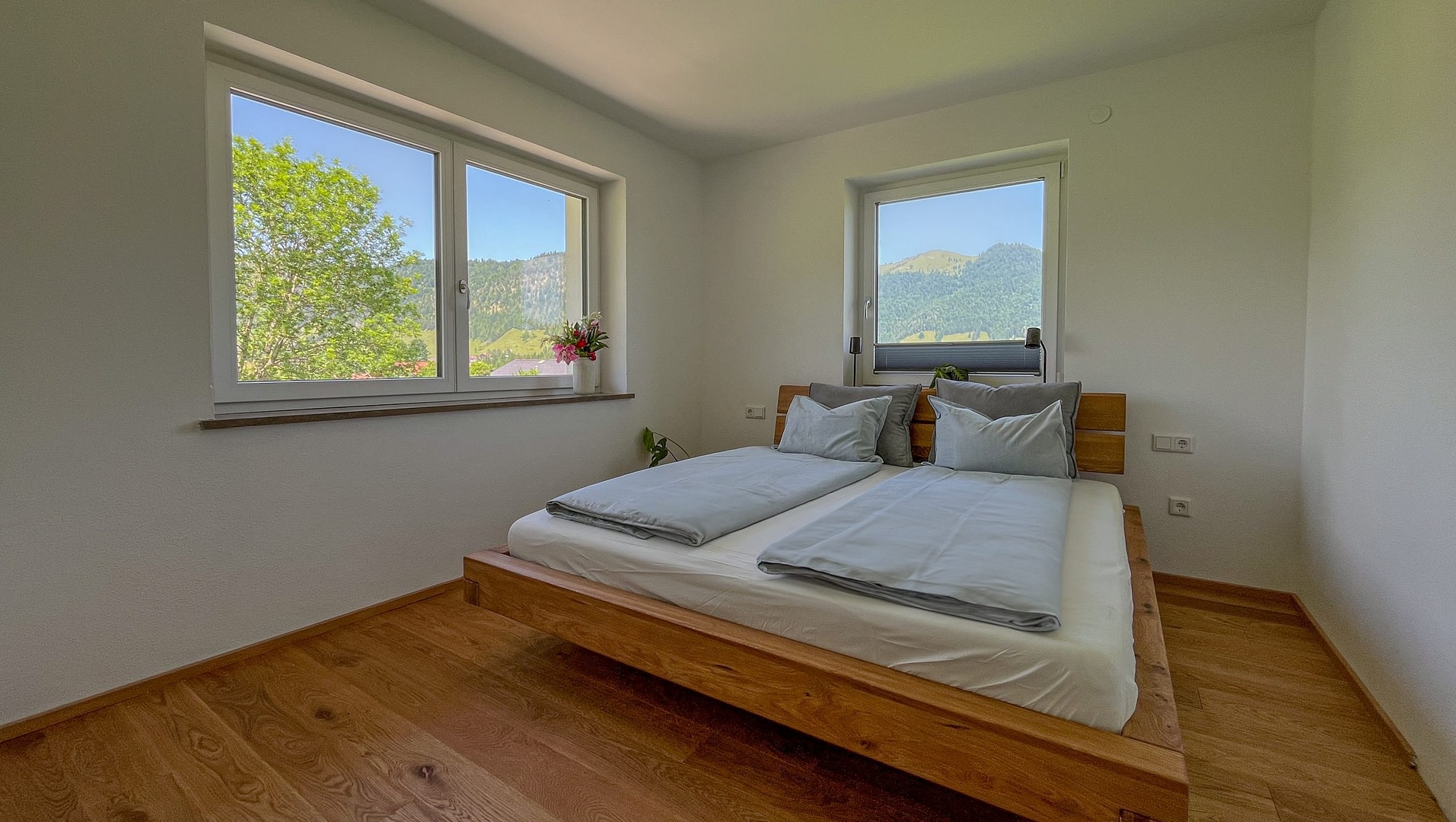Startseite alpinehome walchsee schlafzimmer mit wunderbarem ausblick